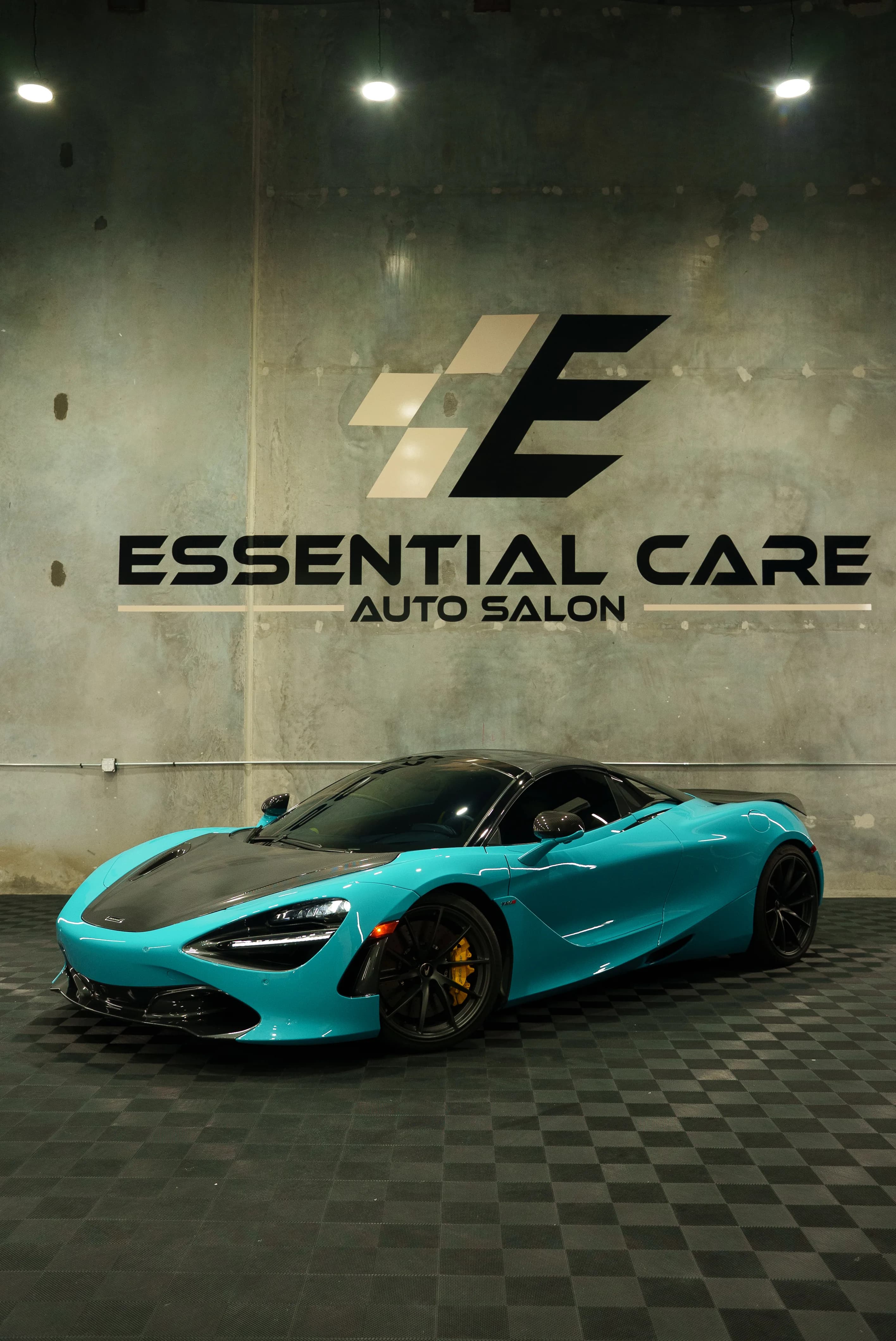 Teal McLaren 720S with a color-change wrap, front three-quarter view